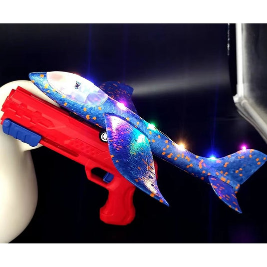 Pistol cu Lansator de Avion, din Polistiren+Plastic, +3 Ani, Avion 38 cm, Lansare 10 m, cu Lumini si Roti, Rosu/Albastru